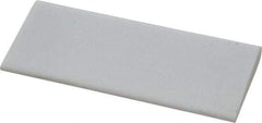 Norton - 4" Long x 1-3/4" Diam x 3/8" Thick, Novaculite Sharpening Stone - Round, Ultra Fine Grade - Best Tool & Supply