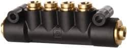 Parker - 1/4" Inlet, 1/4" Outlet Manifold - 3.98" Long x 0.9" Wide 0.21" Mount Hole, 200°F Max, 150 Max PSI, 2 Inlet Ports, 4 Outlet Ports - Best Tool & Supply